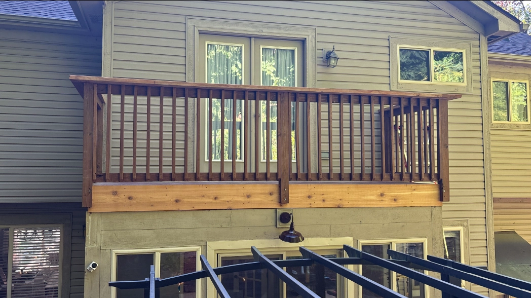 A photo of a custom patio built on the second story of a home