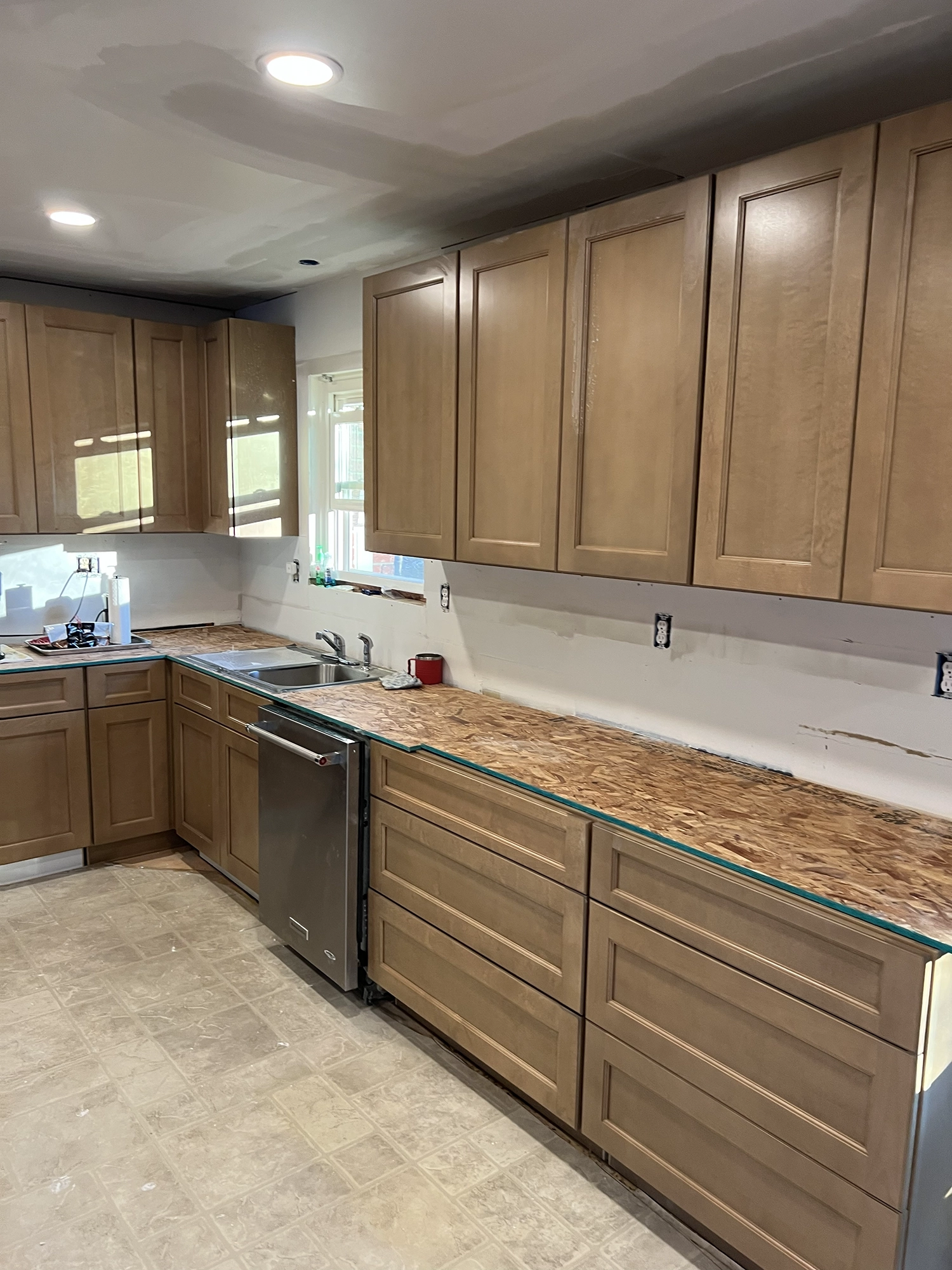 kitchen remodel – cabinets – midway small | Handyman Connection of Lake Orion A photo of a kitchen remodel midway through renovations